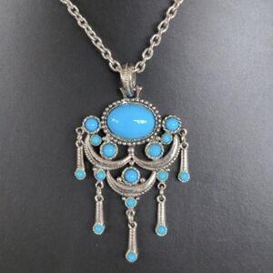 Like new Gothic Bohemian exotic necklace with turquoise color inserts